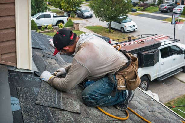 Professional Gutter Repair And Installation technician working in Hardin, TX